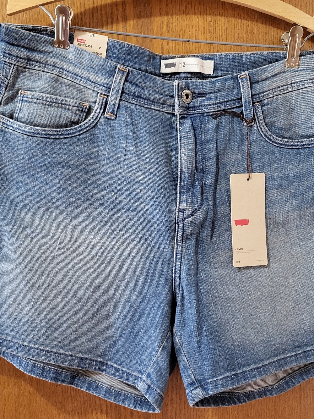 Levi's Red Logo on Cream Tag with Blue Denim Shorts